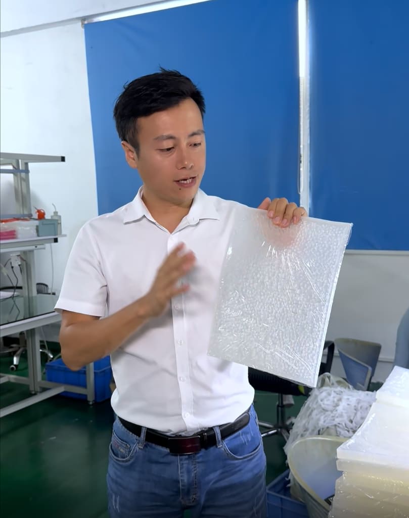 RUUIPON QC checking translucent silicone sheet material in factory