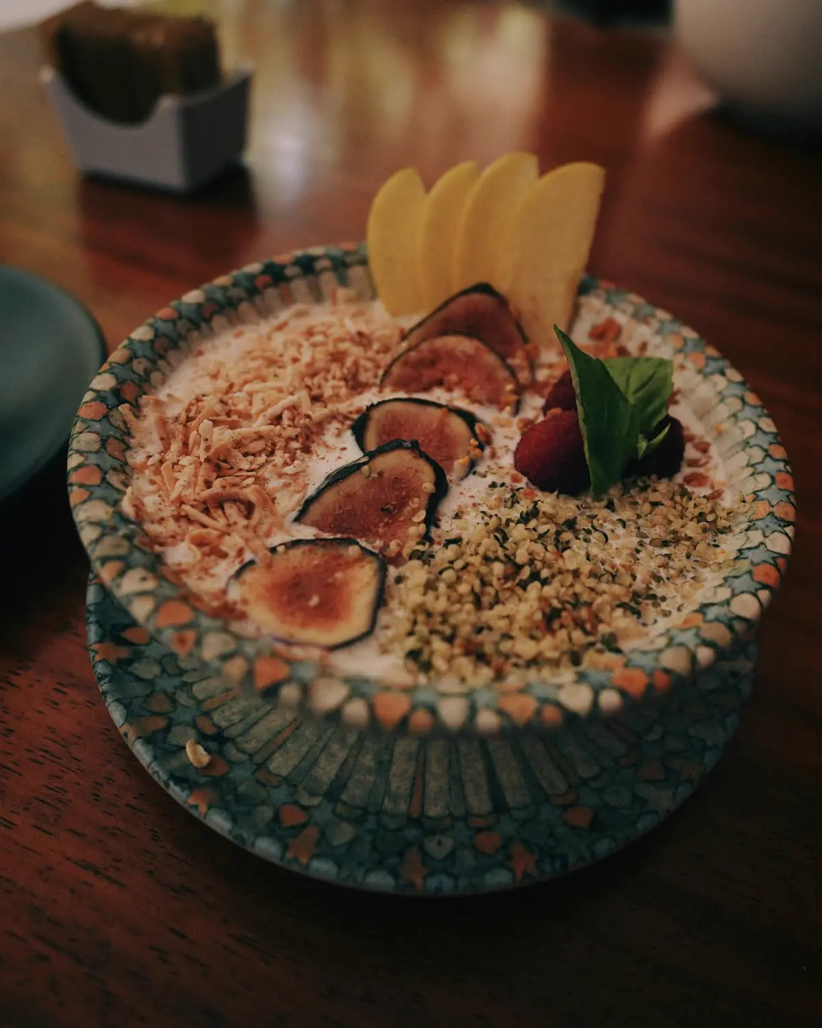 Bowl of yogurt and fresh fruit used as homemade popsicle ingredients